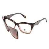 Armazón de lentes Teresa Calandra modelo Roxie, con diseño geométrico y estampa carey en tonos terracota y marrón. Incluye clip-on de sol intercambiable.