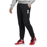 Pantalón de chándal negro Adidas de corte slim fit, con cintura elástica y puños ajustados. Presenta un logo estampado en la pierna izquierda.