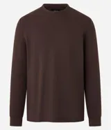 Remera masculina de manga larga en color marrón, con textura waffle y cuello redondo.
