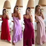 Vestido largo de tirantes con volados en el ruedo, disponible en color rojo, lila, borgoña y rosa.