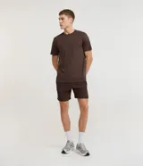 Bermuda deportiva Get Over de color marrón, con cintura elástica y cordón ajustable.