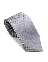 Corbata de seda azul marino con estampado paisley en tonos rosados y blancos.