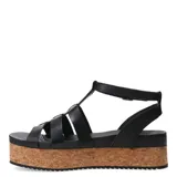 Sandalias de cuero negro con plataforma de corcho, tiras anchas cruzadas y hebilla lateral.