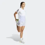 Short de running Adidas color lila con cintura alta, tres tiras negras en los laterales y logo reflectante.