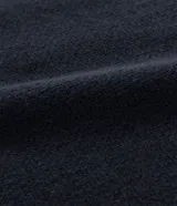 Chaleco negro de punto con cuello redondo y sin mangas.