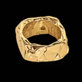 Anillo ancho de bronce con diseño orgánico y volumétrico, de superficie irregular y acabado brillante.
