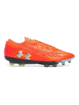 Championes de fútbol Under Armour Magnetico Elite 4 FG, color naranja vibrante con detalles en gris y verde neón. Presentan tecnología UA Clone en la parte superior para un ajuste personalizado, impresión 3D para mayor control y suela ligera con tacos mixtos para tracción multidireccional.