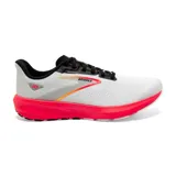 Championes de running Brooks Launch 10 para mujer, color blanco con detalles en gris, negro y naranja. Suela de goma color fucsia.