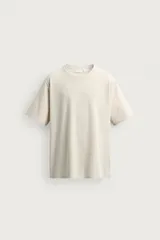 Camiseta de corte regular fit en mezcla de algodón y lino, con cuello redondo y manga corta de la colección Origins.