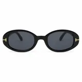 Lentes de sol con armazón ovalado de carey y micas marrones, con detalle metálico dorado en las esquinas y patillas.