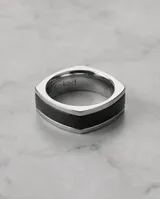 Anillo de acero con franja central color negro.