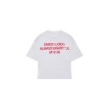 Remera oversize gris melange de manga corta con estampa frontal en color rojo que incluye texto institucional de la marca.