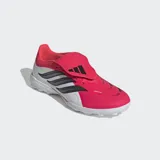 Championes de fútbol Adidas Predator League con lengüeta plegable, diseñados para césped artificial. Presentan una combinación de colores blanco, rosa y negro, con tecnología Nanostrike en el empeine de malla y Powerspine para mayor estabilidad y potencia en el disparo.