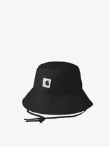 Sombrero de pescador negro de sarga de algodón con cordón ajustable y etiqueta cuadrada tejida con el logo de Carhartt en el frente.