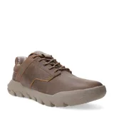 Championes Caterpillar de estilo urbano, confeccionados en cuero marrón con detalles de costuras reforzadas. Presentan una suela de goma robusta con diseño texturizado y cierre mediante cordones.