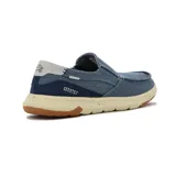 Zapato casual de hombre tipo slip-on, color azul marino, confeccionado en denim con detalles elásticos en los laterales para mayor comodidad, suela beige moteada y refuerzo trasero con la inscripción "Country".