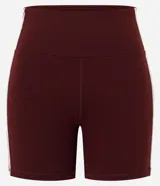 Bermuda deportiva femenina de tiro alto en color bordó, con calce ajustado y líneas contrastantes en los laterales.