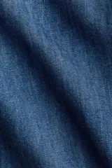 Top en denim de algodón suave con escote halter, cierre de botón en la nuca, pinzas en el busto y corte en la cintura.