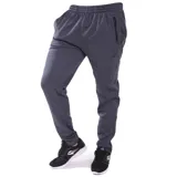 Pantalón de jogging Topper, color gris oscuro melange, con cintura elástica, bolsillos laterales con cierre y logo de la marca bordado en la pierna.