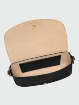 Bandolera Longchamp modelo Épure Timeless M, de color negro con correa ancha de lona en tono marrón. Presenta solapa frontal con cierre de botón metálico dorado y detalles de herrajes en el mismo tono.