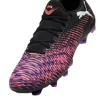 Championes de fútbol Puma Future 8 Play FG/AG, color negro con detalles en fucsia, naranja y violeta.