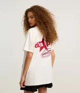 Remera blanca de algodón con estampado de Dua Lipa en el frente.