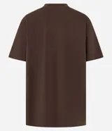 Remera marrón de algodón con cuello redondo y mangas cortas. Estampado frontal con la leyenda "Madrid Museo del Prado EST 1987" en color blanco.