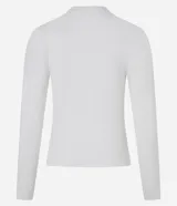 Blusa de manga larga confeccionada en punto ligero con textura diferenciada. Presenta un diseño ajustado al cuerpo y cuello alto.