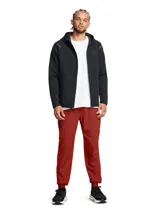 Campera deportiva con capucha y cierre frontal completo, confeccionada en tejido polar de doble punto. Presenta mangas raglán, bolsillos laterales con cierre y detalles reflectantes en los hombros. Diseño ergonómico y transpirable con logo de la marca en el pecho.