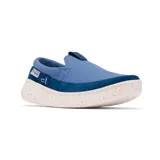 Zapatilla tipo slip-on Columbia Boatside PFG, color azul, con empeine de lona y ante. Presenta una suela de plataforma blanca con motas de colores y tecnología Omni-GRIP LT para mayor tracción y ligereza.