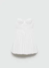 Vestido corto de color blanco con escote corazón y tirantes finos ajustables. Presenta un diseño tipo corset en la parte superior y una falda con volumen tipo globo. Incluye cierre lateral invisible.