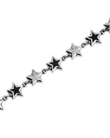 Pulsera de plata 925 con eslabones en forma de estrella. Las estrellas son plateadas con el centro esmaltado en negro.