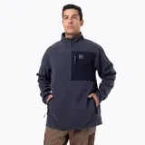 Buzo polar de microfleece con media cremallera, cuello alto y bolsillo frontal con cierre. Presenta paneles de contraste en nylon ripstop en la zona del pecho y detalles elásticos en puños y ruedo.