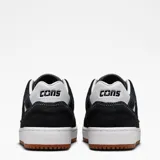 Championes Converse modelo AS-1 Pro, color negro con detalles en blanco. Presentan capellada de gamuza con costuras visibles, el icónico logo de estrella y chevrón en el lateral, cordones blancos y suela de goma color caramelo.
