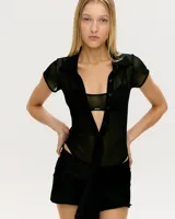 Conjunto de body y pollera de tela italiana de alta calidad.