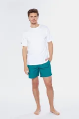 Short de baño liso color verde esmeralda, con cintura elástica y cordón ajustable.