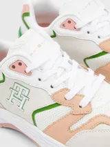 Zapatillas de estilo running con diseño de paneles en malla y cuero, con cordones y suela de EVA.