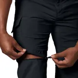 Pantalón cargo convertible negro de microfibra de poliéster, con bolsillos laterales y tecnología Omni-Shade UPF 50 y Omni-Wick.