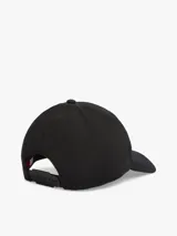 Gorra tipo trucker color negro, con paneles de malla transpirable en la parte trasera y parche bordado con el logo de Tommy Jeans en el frente.