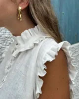 Aros colgantes con forma de hojas, realizados en bronce y alpaca, con pernos y cierres mariposa de plata 925.