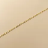 Pulsera de cadena tipo figaruchi confeccionada en oro 18k, con eslabones de diseño clásico y cierre seguro.