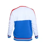 Buzo de fútbol Umbro del Club Nacional de Football, con diseño de bloques de color blanco, azul y rojo. Incluye logo de Umbro y escudo del club.
