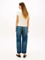 Chaleco de punto trenzado Tommy Hilfiger color blanco, con cuello en V, corte regular y logo bordado en el pecho.
