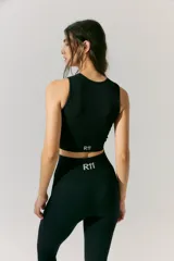 Calza larga tejida de morley color negro, sin costuras, con logo R11 en la cintura trasera a contratono.