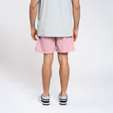 Short de baño azul marino de nylon con cintura elástica y logo de la marca en la pierna.