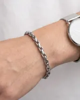 Pulsera de eslabones entrelazados de acero, con acabado brillante y diseño clásico.