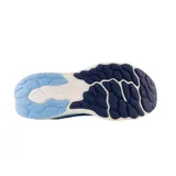 Championes de running New Balance Fresh Foam X 1080v12, color celeste con detalles en azul y blanco.