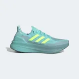 Championes de running Adidas Ultraboost 5, color verde azulado (teal) con detalles en amarillo neón. Presentan un empeine de tejido PRIMEKNIT y una mediasuela con tecnología Light BOOST V2.
