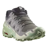 Calzado de trekking Salomon modelo Speedcross 6, en tonos gris y verde claro, diseñadas para trail running con suela de gran tracción y cordones de ajuste rápido.