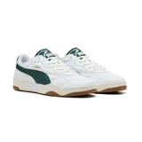 Championes Puma modelo Tifosi, de diseño urbano con capellada en color negro, detalle de franja lateral blanca y suela de goma en tonos marrón y crema.